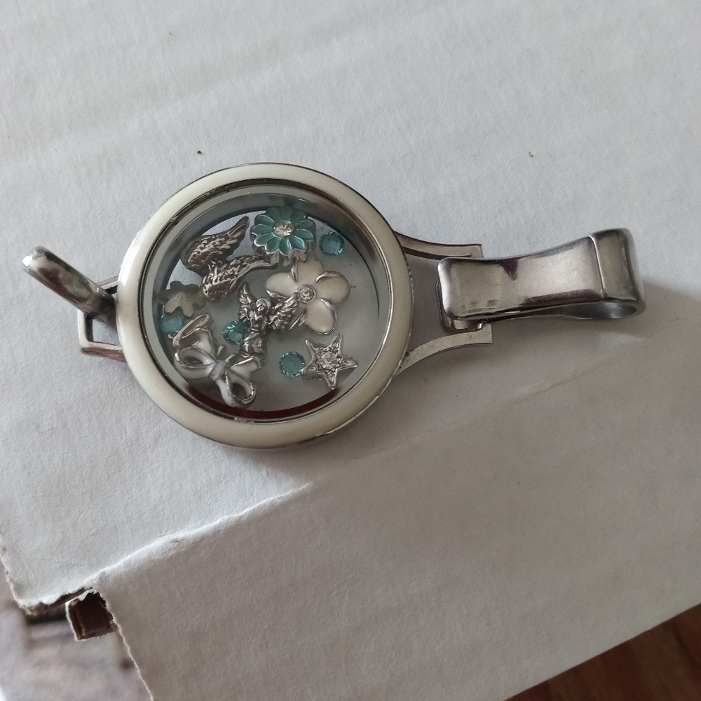 Origami owl floating charm locket. Wings, angel, flowers, love.